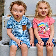 Major is registered to the contest to win money with this photo: children, toddler, siblings, friends, smiling, happy, portrait, outdoor, steps, seated, curly_hair, blonde_hair, blue_outfit, pink_shirt, rainbow, cowboy_boots, pink_shoes, concrete, daylight, phone_watermark