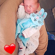 Tiago a rejoint le concours — aidez-le/la à gagner de superbes lots ! adorable, baby, blanket, blue, bunny, child, comfort, couch, cozy, cute, heart_emoji, indoors, infant, peaceful, plush_toy, resting, sleeping, socks, soft_texture, white_clothing