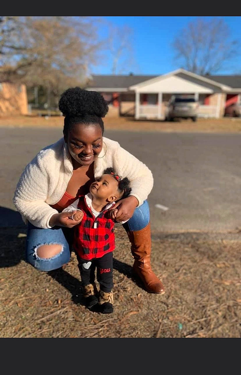 Kamiya is registered to the contest to win money with this photo: asphalt, baby, child, flash_photography, fun, gesture, grass, happy, hat, joy, landscape, leg, leisure, people_in_nature, person, sitting, sky, sneakers, soil, toddler