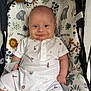 Louis joined the competition — help win amazing prizes! baby, infant, smiling, romper, white_clothing, baby_seat, patterned_fabric, animal_print, floral_print, cute, chubby_cheeks, child, indoors, comfort, seat_belt, portrait, happy, playful, closeup, person