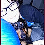 person, dog, glasses, blanket, pillow, indoor, snuggle, flash, face, pet, comfort, bedroom, black, brown, close_up, cuddle, resting, casual, human, animal