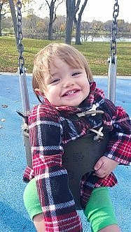 Tamyra joined the competition — help win amazing prizes! baby_products, child, day, design, fun, girl, infant, joy, outerwear, pattern, person, plaid, play, product, recreation, smile, tartan, toddler, vacation