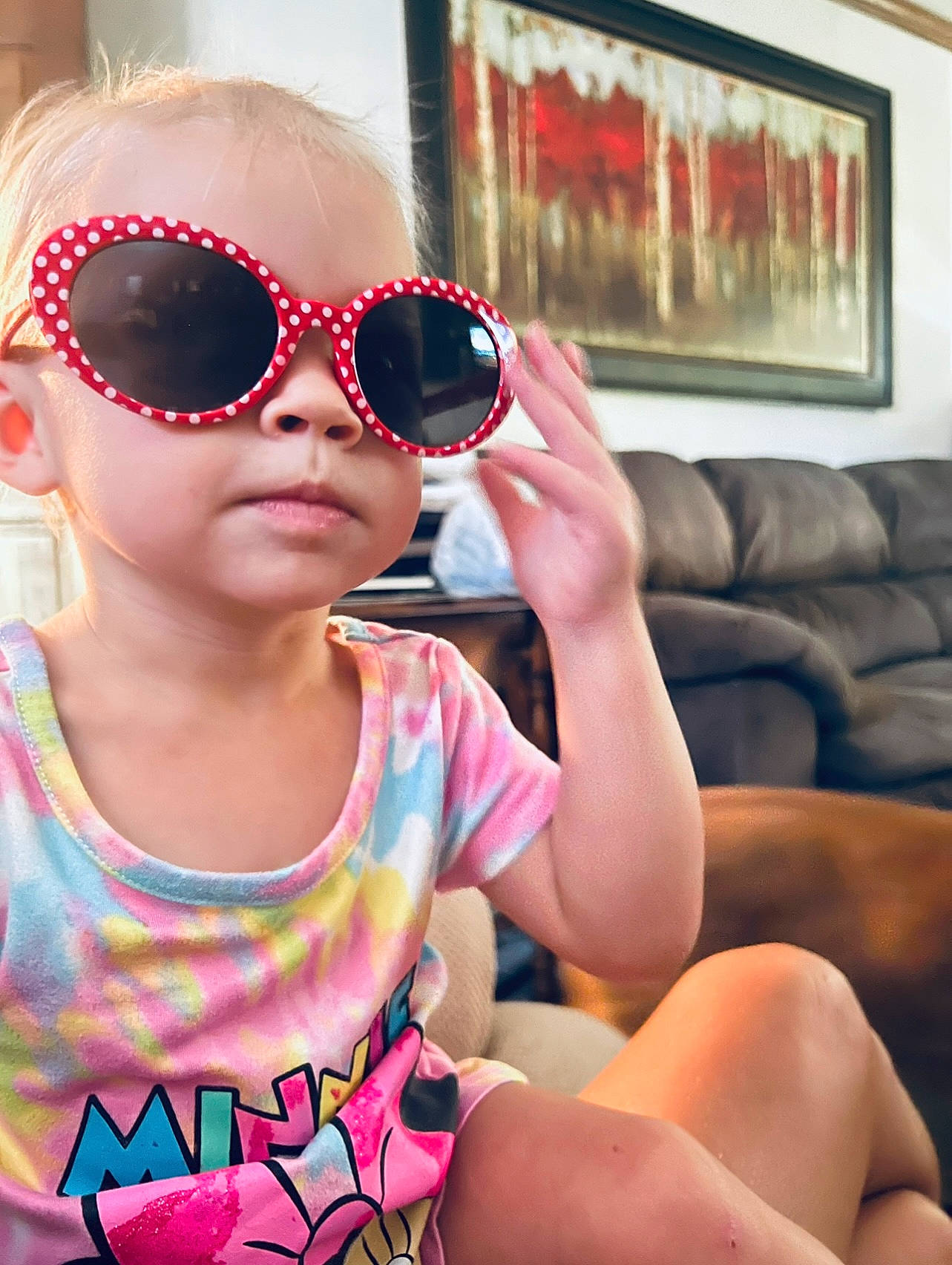 Raelynn is registered to the contest to win money with this photo: baby_toddler_clothing, comfort, cool, couch, eyelash, eyewear, fun, glasses, goggles, happy, leisure, lip, magenta, mouth, person, picture_frame, skin, sunglasses, thigh, toddler
