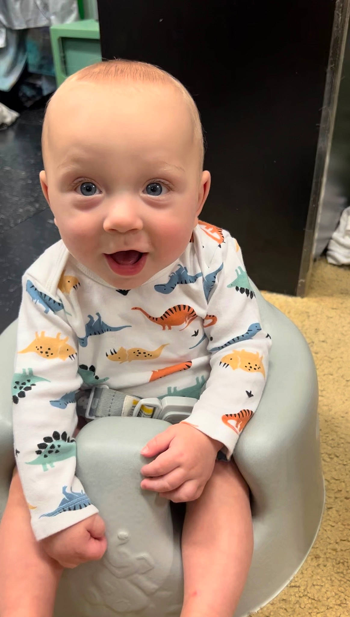 Ethan is registered to the contest to win money with this photo: baby, baby_toddler_clothing, cheek, child, chin, eye, face, flooring, fun, happy, head, human_body, knee, kneeling, mouth, person, skin, sleeve, smile, toddler