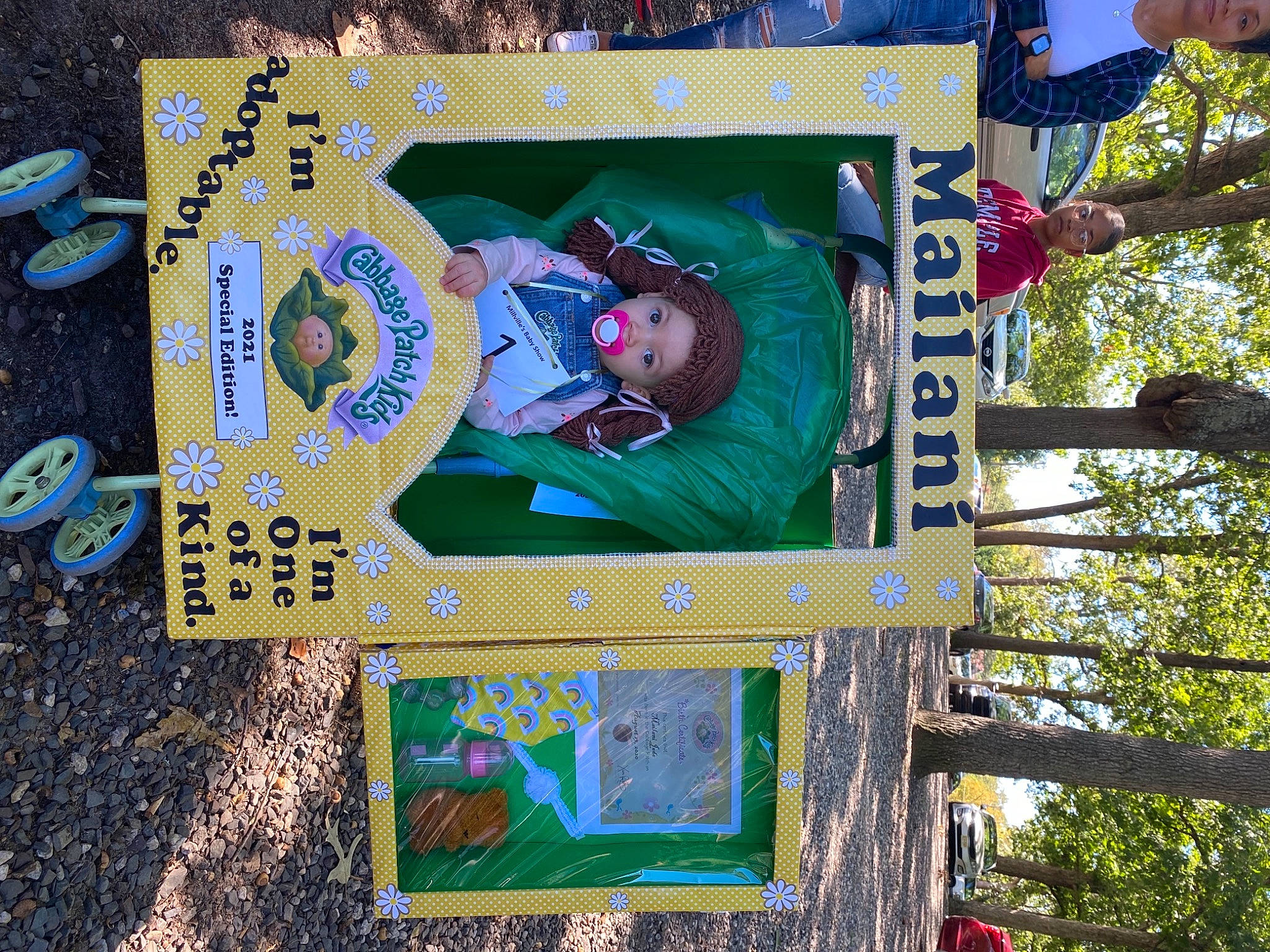 Mailani joined the competition — help win amazing prizes! fictional_character, font, fun, grass, headwear, landscape, leisure, person, plant, play, recreation, soil, tree, visual_arts, wood, world