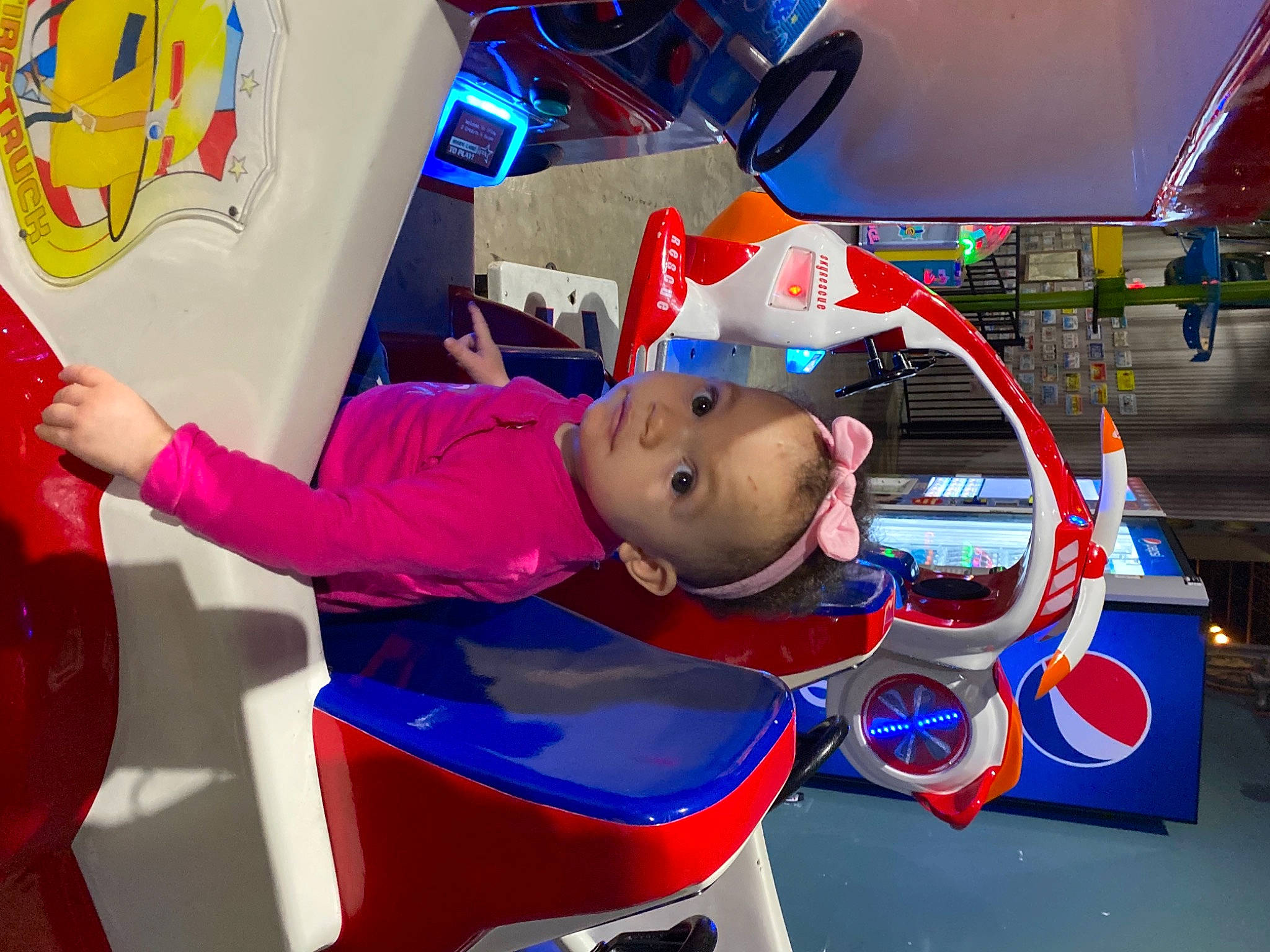 Mailani is registered to the contest to win money with this photo: automotive_design, automotive_exterior, baby, bumper, child, cool, electric_blue, fictional_character, fun, games, headgear, leisure, motor_vehicle, person, personal_protective_equipment, play, playground, product, recreation, space