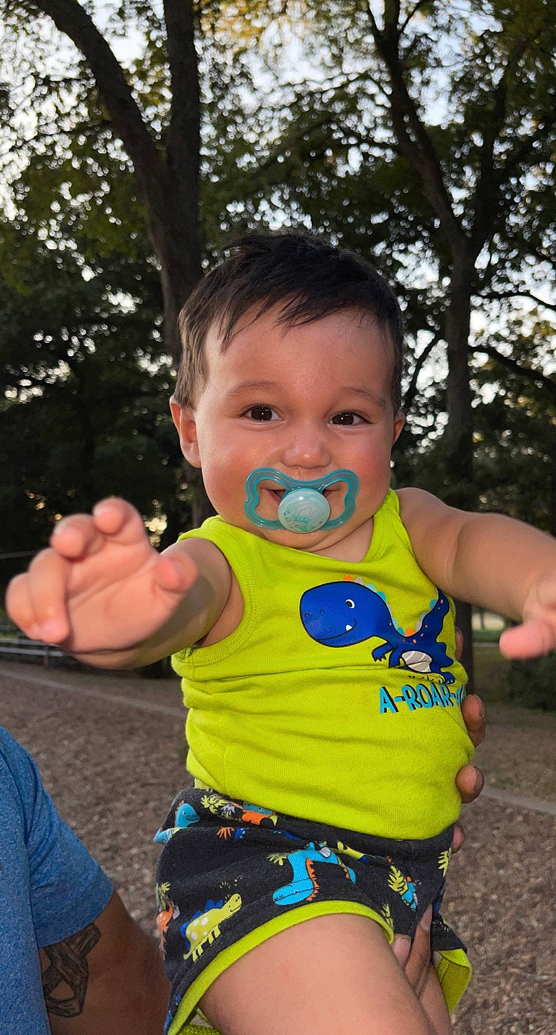Keelan joined the competition — help win amazing prizes! baby, baby_toddler_clothing, cheek, child, face, fun, gesture, grass, hand, happy, joy, leisure, mouth, people_in_nature, person, recreation, sitting, sleeve, t_shirt, thumb