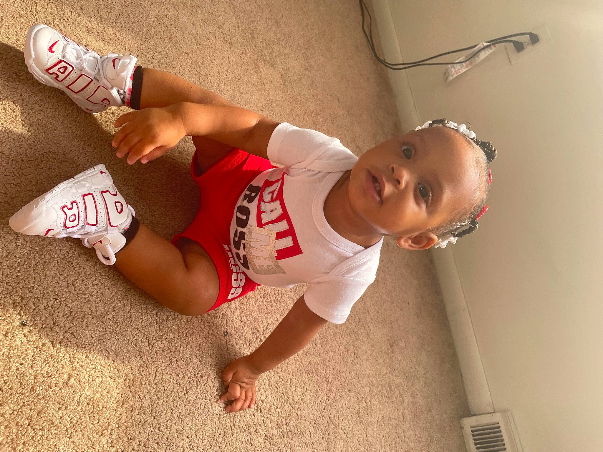 Nevaeh is registered to the contest to win money with this photo: abdomen, chest, elbow, eyewear, finger, floor, flooring, glasses, hand, happy, jeans, knee, leg, person, shorts, sleeve, sportswear, stomach, thigh, trunk