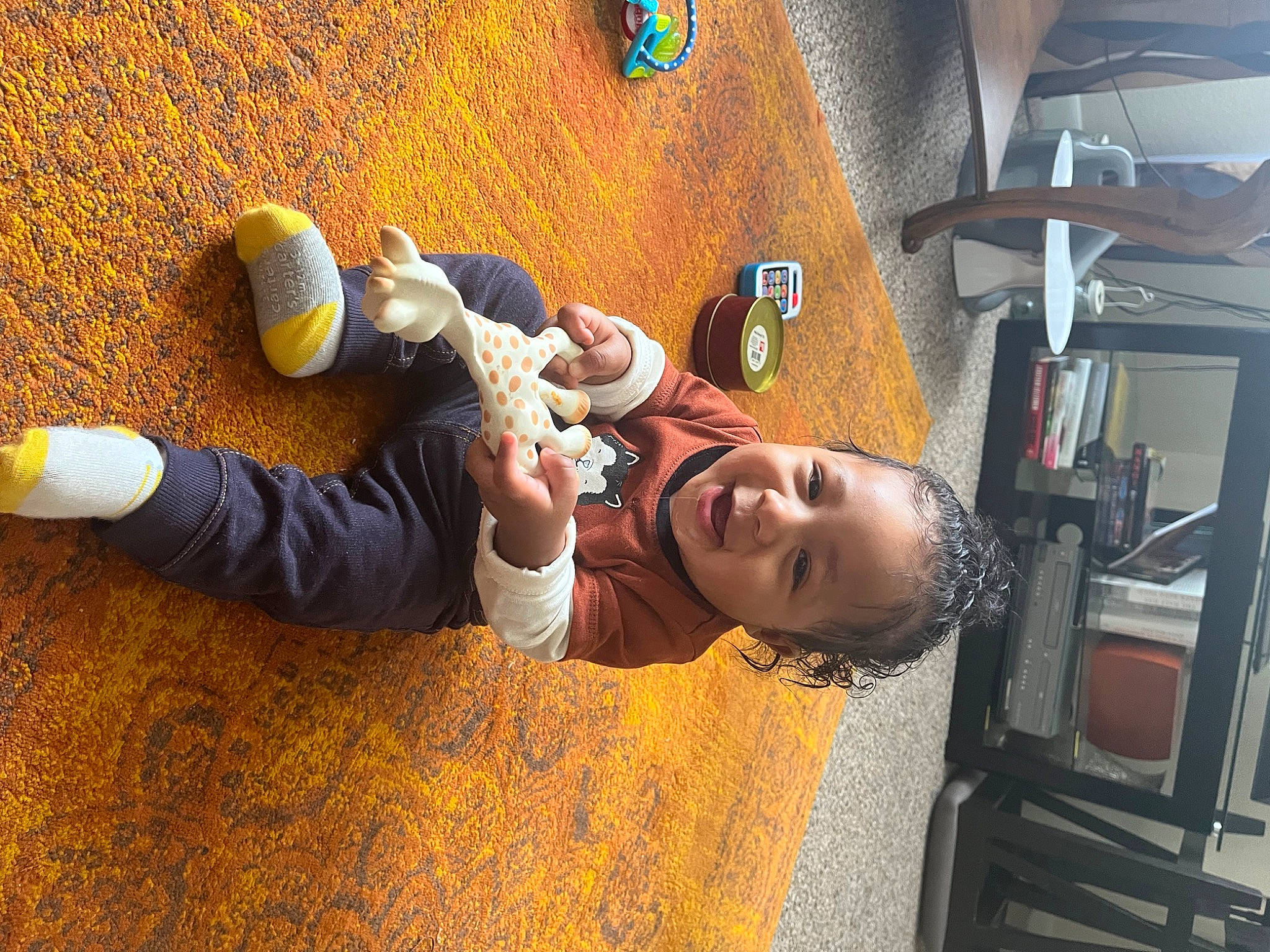 Donavon joined the competition — help win amazing prizes! child, comfort, finger, flooring, fun, happy, human_leg, leisure, person, play, recreation, room, sitting, smile, toddler, wood, yellow