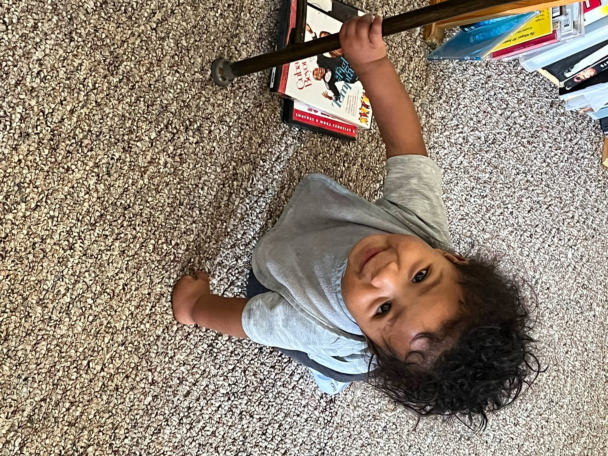 Donavon joined the competition — help win amazing prizes! asphalt, child, city, floor, flooring, fun, grass, happy, human_leg, leisure, person, road, road_surface, shadow, sidewalk, sitting, smile, street, t_shirt, toddler