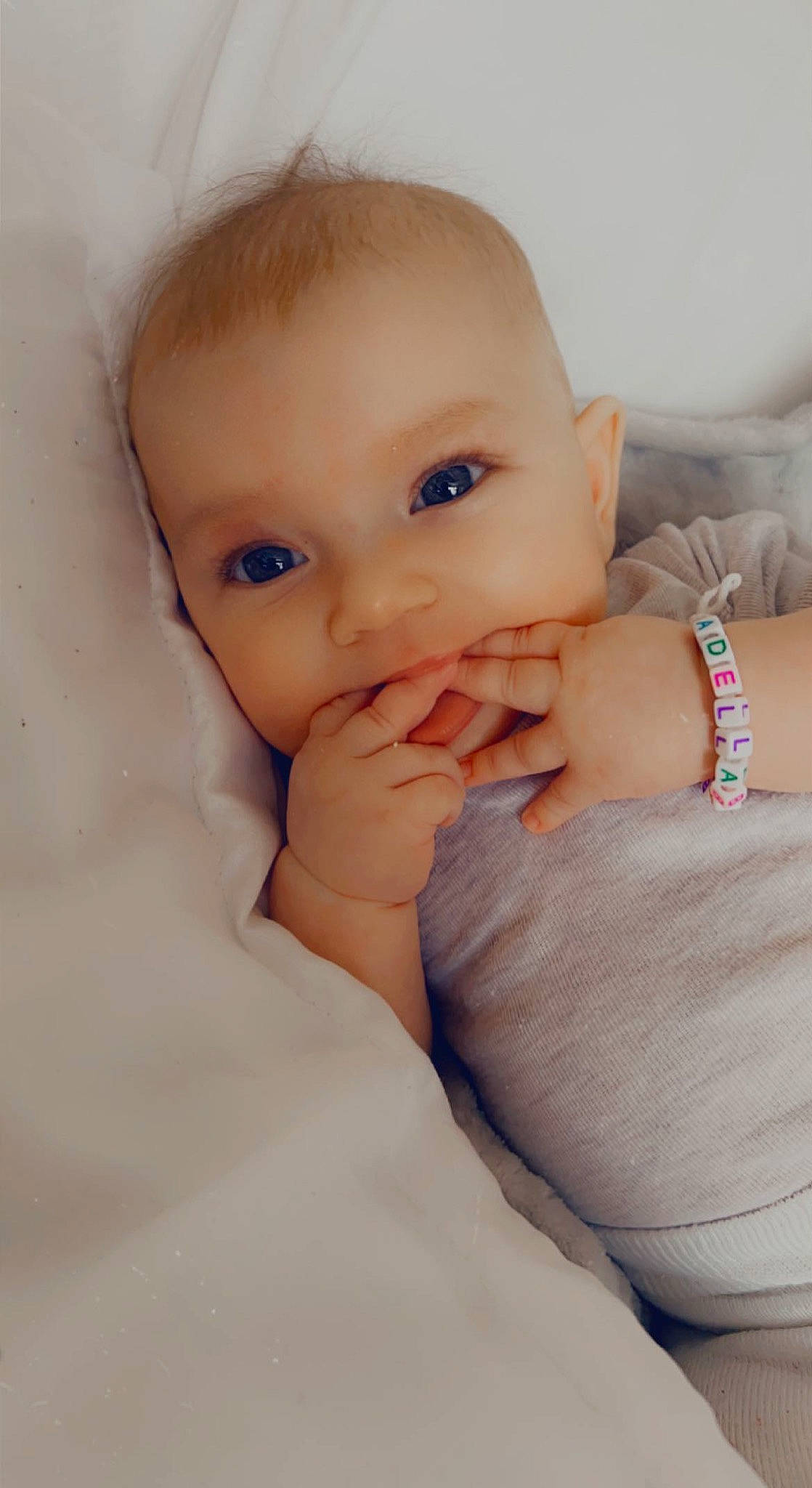 Adela Ioana is registered to the contest to win money with this photo: arm, baby, baby_toddler_clothing, cheek, comfort, ear, eye, eyelash, finger, flash_photography, gesture, hand, happy, human_body, iris, lip, neck, nose, person, skin