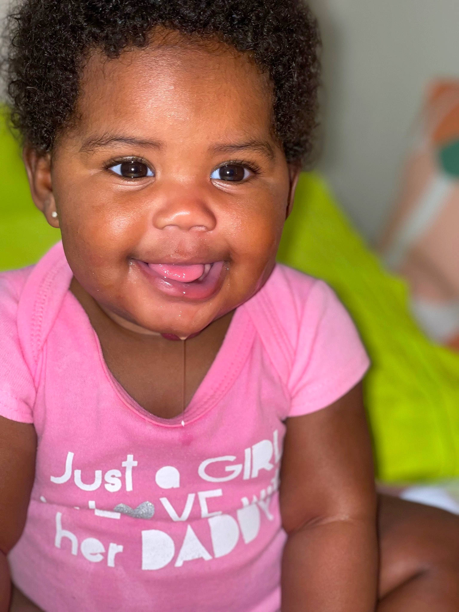 Aubrey is registered to the contest to win money with this photo: black, black_hair, cheek, child, ear, eyebrow, forehead, hairstyle, happy, iris, joy, lip, mouth, nose, organ, person, pink, skin, sleeve, smile