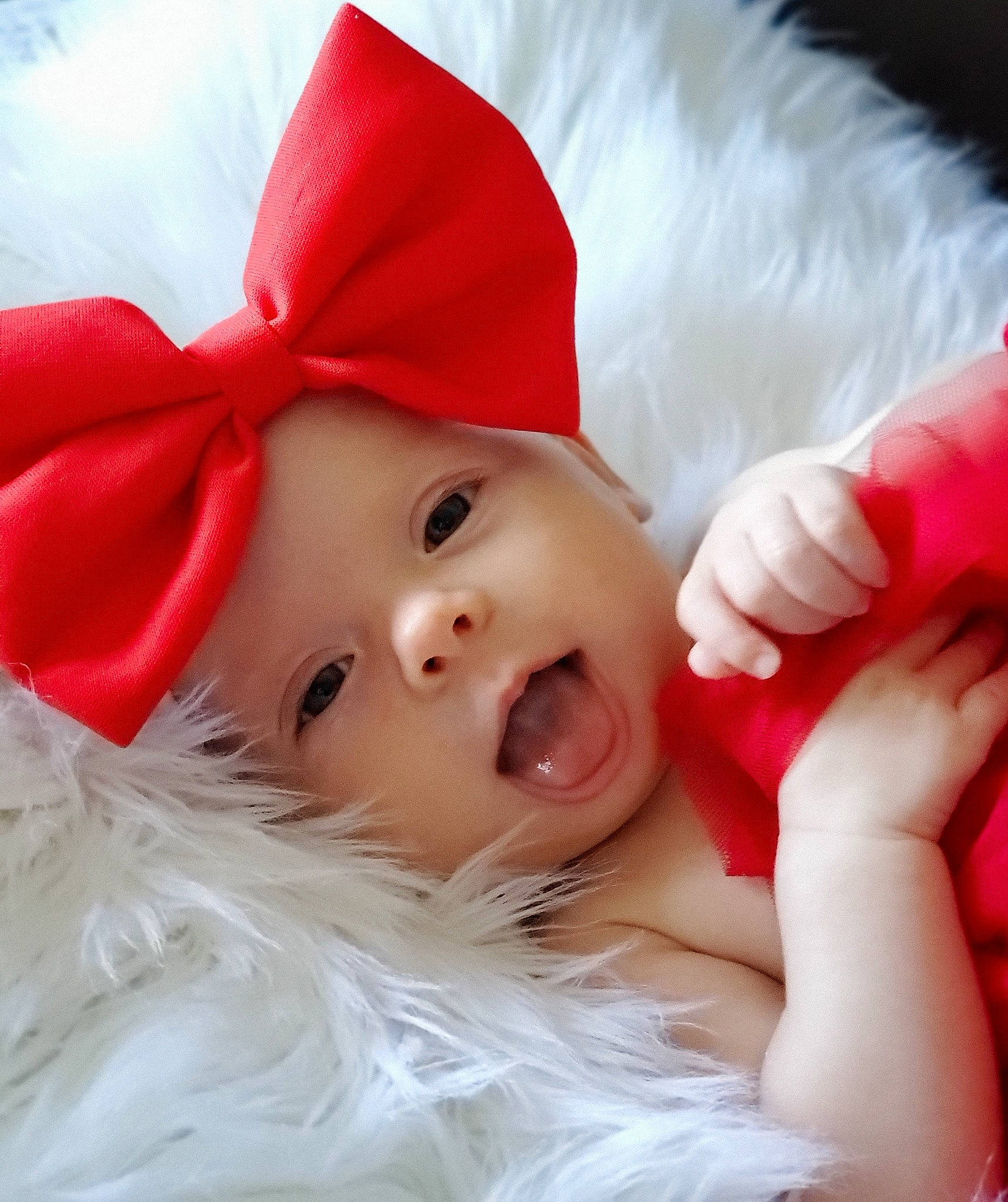 Lisa is registered to the contest to win money with this photo: baby, beauty, cheek, child, costume, eye, face, fictional_character, happy, head, headgear, lip, mouth, nose, person, pink, portrait_photography, red, skin, smile