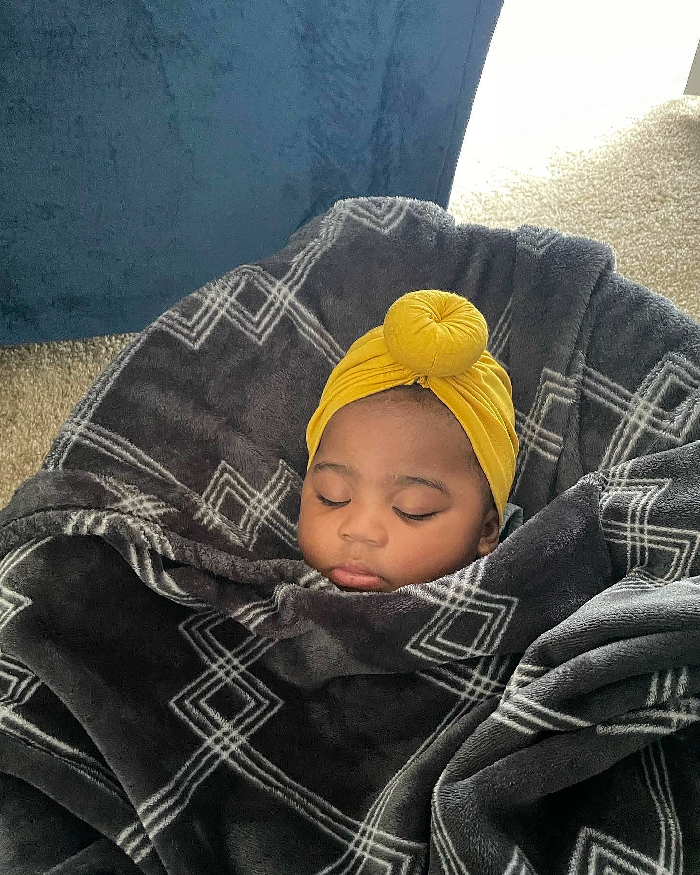 Lia joined the competition — help win amazing prizes! baby, baby_carriage, baby_products, baby_sleeping, beanie, cap, car_seat, child, comfort, fashion_accessory, headwear, nap, pattern, person, personal_protective_equipment, plaid, sitting, sleep, tartan, tints_and_shades