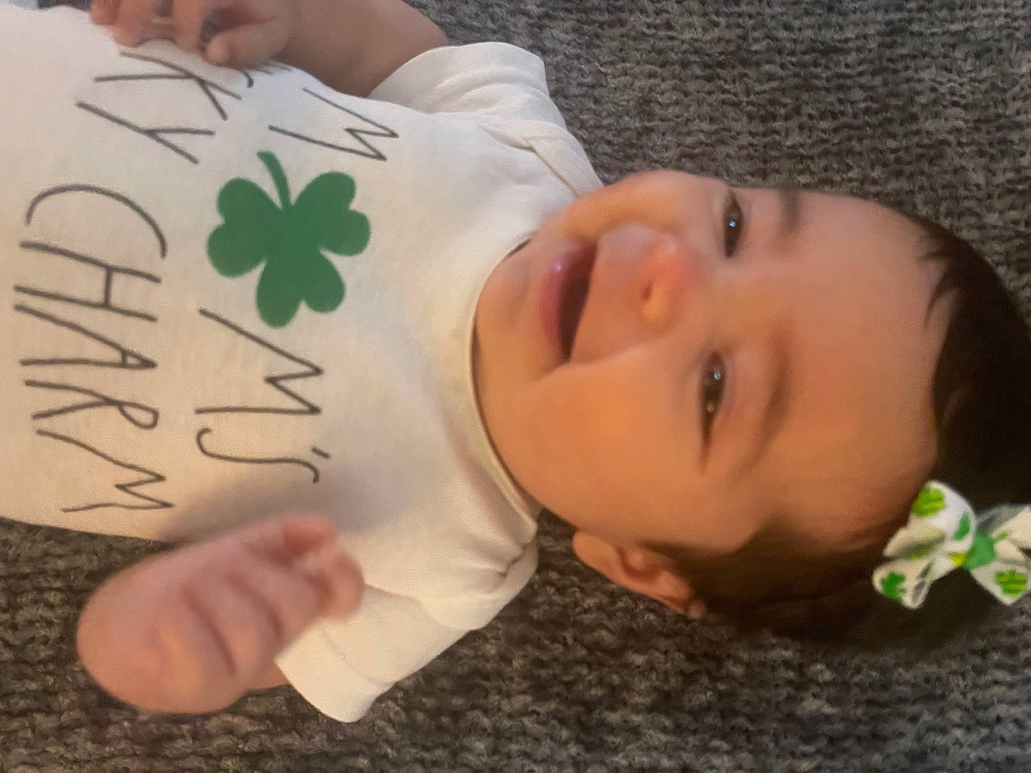 Audriana joined the competition — help win amazing prizes! baby_toddler_clothing, cheek, child, finger, flooring, font, grass, happy, nail, nose, pattern, person, room, skin, sleeve, smile, thumb, toddler