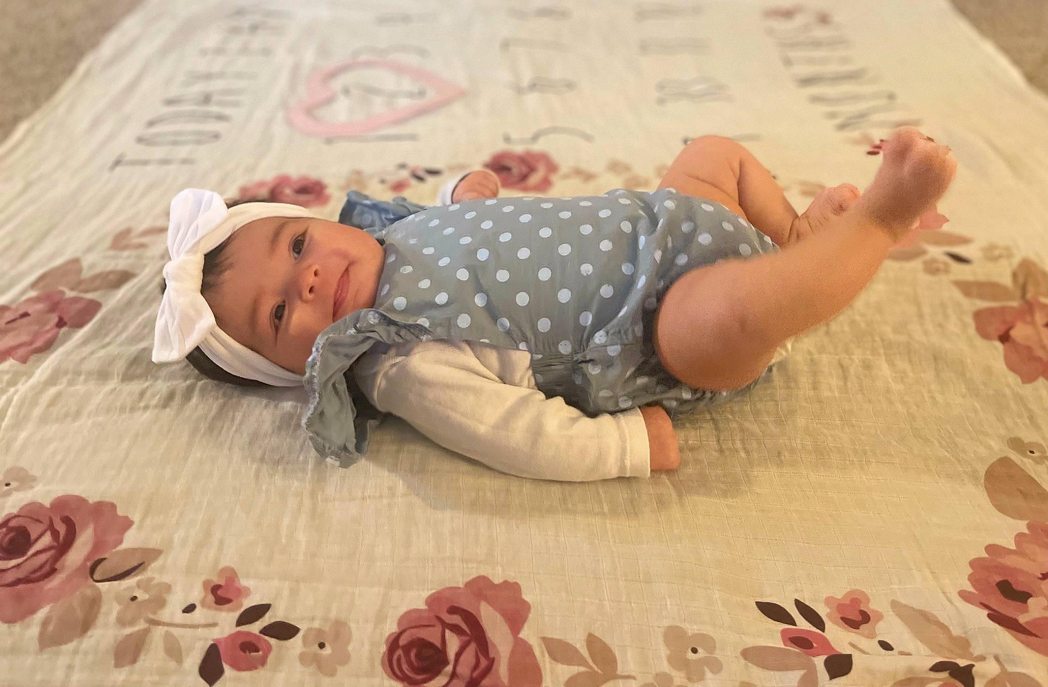Audriana joined the competition — help win amazing prizes! baby, baby_toddler_clothing, beauty, bedding, child, comfort, finger, floor, flooring, happy, headwear, leaf, linens, organ, pattern, person, petal, pink, product, textile