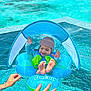 baby, pool, water, inflatable, float, sunshade, swimming, child, smiling, hands, blue, summer, outdoor, safety, playful, cute, fun, feet, hat, lifejacket