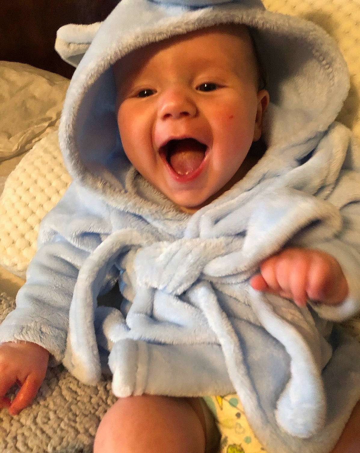 Brett is registered to the contest to win money with this photo: baby, baby_laughing, cheek, child, facial_expression, headwear, laugh, mouth, nose, person, skin, smile, toddler, yawn
