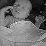 baby, newborn, sleeping, blanket, infant, child, peaceful, wrapped, hand, portrait, monochrome, black_and_white, soft, cute, resting, toddler, indoors, face, calm, young
