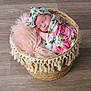 Kinsley joined the competition — help win amazing prizes! baby, basket, blanket, child, cozy, cute, decor, floor, floral_pattern, headband, indoors, infant, newborn, peaceful, pink, portrait, resting, sleeping, soft, woven