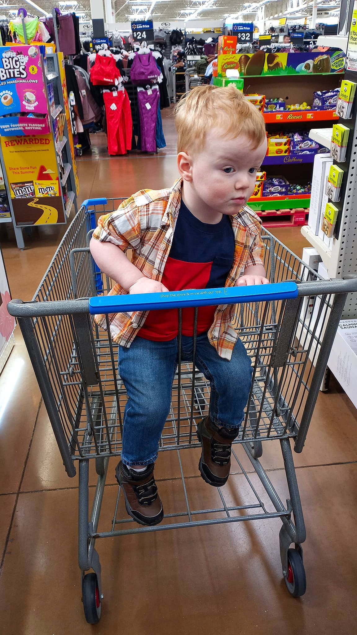 Keanu is registered to the contest to win money with this photo: cart, child, cleanliness, clothing, customer, engineering, flooring, fun, person, photograph, product, retail, shelf, shoe, shopping, shopping_cart, snapshot, standing, tire, toddler