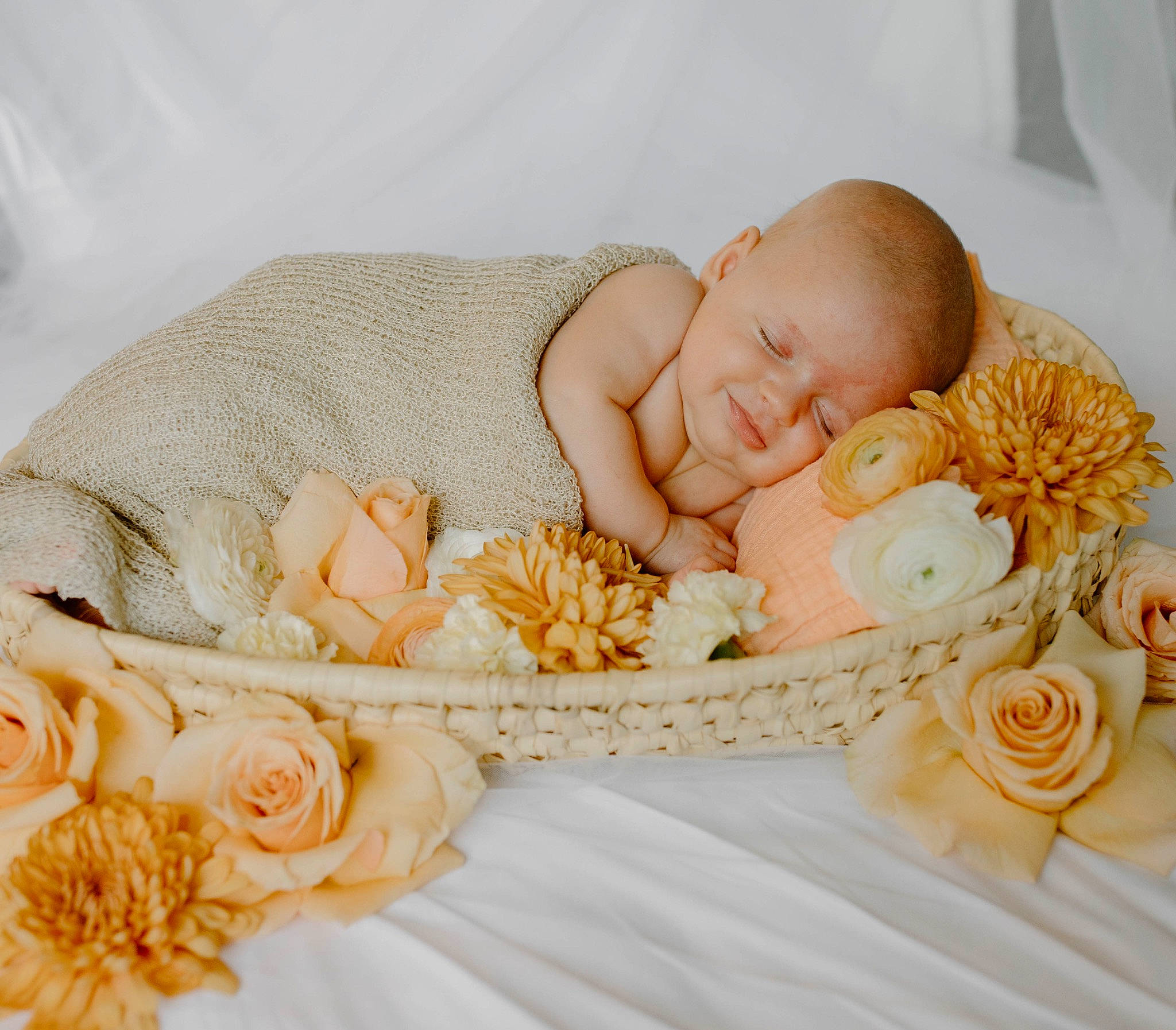 Adeline is registered to the contest to win money with this photo: baby, baby_products, baby_sleeping, baby_toddler_clothing, bedding, bedtime, comfort, fashion_accessory, flower, hair_accessory, headgear, linens, orange, pattern, peach, person, petal, product, rose, textile