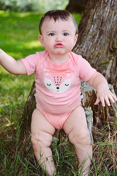 Oaklei is registered to the contest to win money with this photo: baby, baby_toddler_clothing, child, child_model, grass, meadow, people_in_nature, person, photography, pink, plant, portrait, portrait_photography, skin, smile, toddler