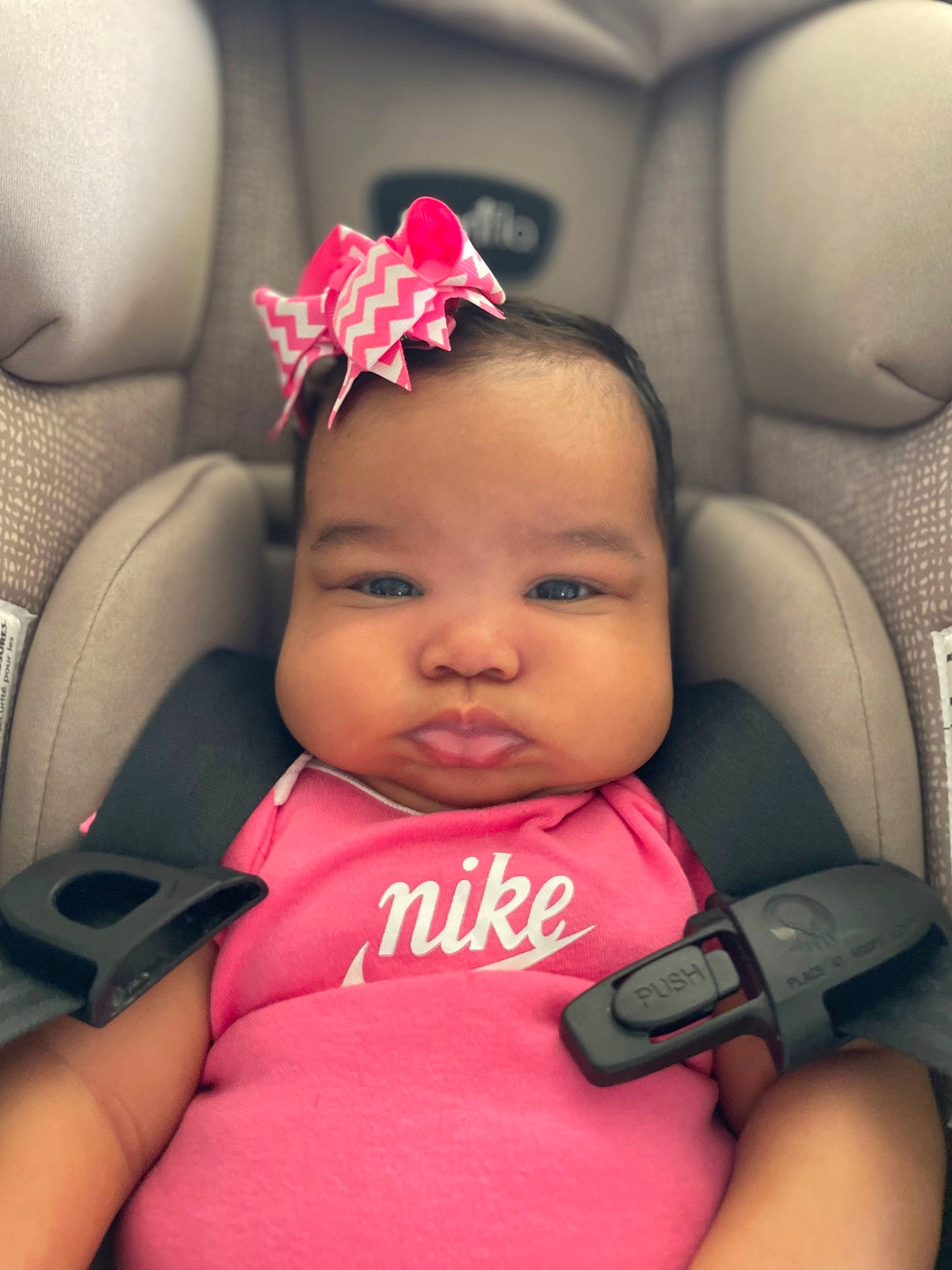 Miya is registered to the contest to win money with this photo: auto_part, baby, baby_carriage, baby_products, baby_toddler_clothing, car_seat, cheek, child, comfort, cool, eyelash, finger, happy, lip, magenta, person, pink, skin, thumb, toddler