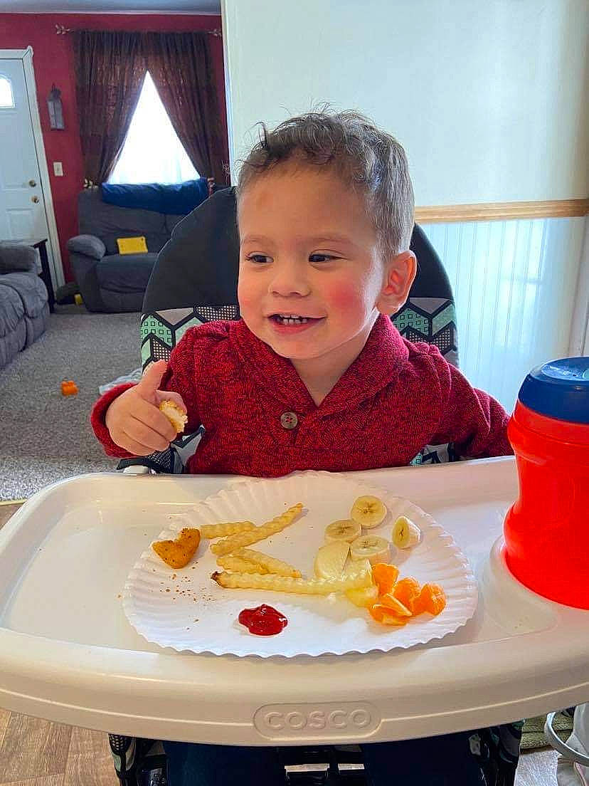 Kristian joined the competition — help win amazing prizes! baby, chair, child, comfort_food, cuisine, curtain, dish, eating, event, food, food_craving, joy, junk_food, orange, person, plate, sharing, sitting, smile, table