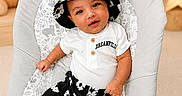 Noah Sotolongo joined the competition — help win amazing prizes! baby, infant, child, hat, clothing, black_and_white, floral_pattern, baby_seat, teddy_bear, nursery, decor, stars, clouds, shoes, smiling, portrait, indoor, cute, comfortable, happy
