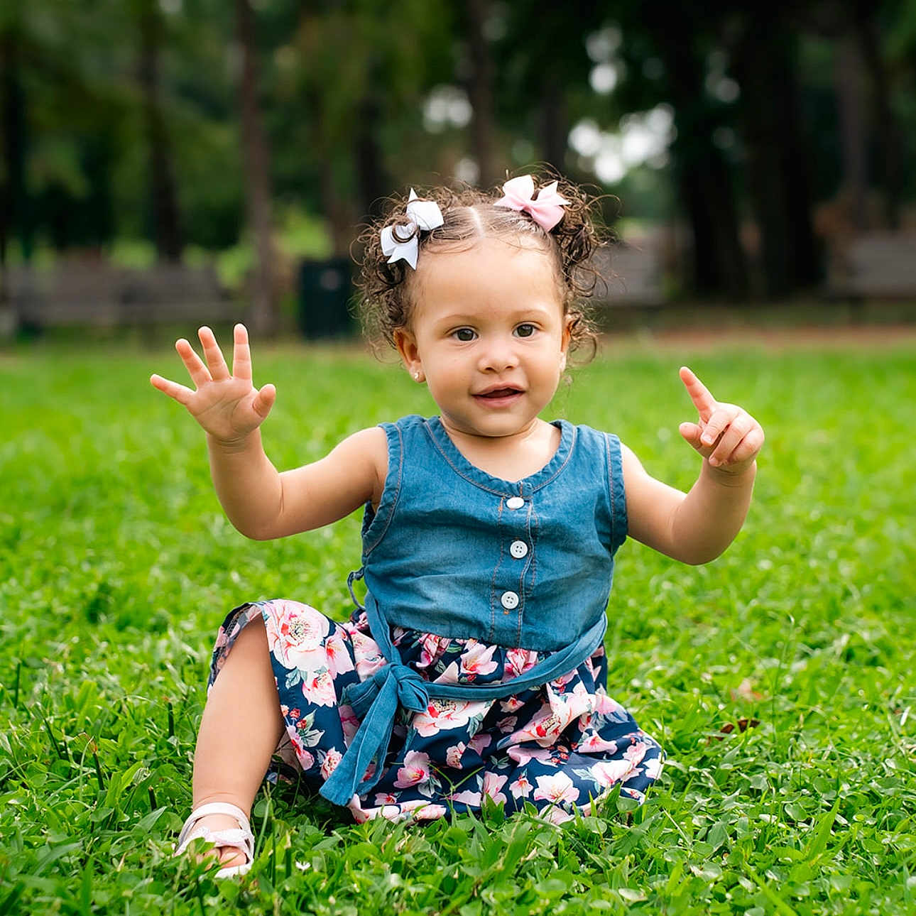 Mila is registered to the contest to win money with this photo: bodypart, child, clothing, dress, face, female, finger, girl, grass, hand, head, lawn, nature, outdoors, park, person, photography, plant, portrait, sitting