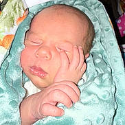 Paxton is registered to the contest to win money with this photo: baby, blanket, child, closeup, comfort, cozy, cute, face, hand, indoors, infant, newborn, peaceful, portrait, resting, skin, sleeping, soft, tender, wrapped