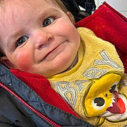 Mason is registered to the contest to win money with this photo: toddler, child, baby_shark, yellow_sweater, red_jacket, smile, face, close_up, curly_hair, cheeks, cute, indoor, clothing, childhood, portrait, happy, person, warm_clothes, baby, jacket