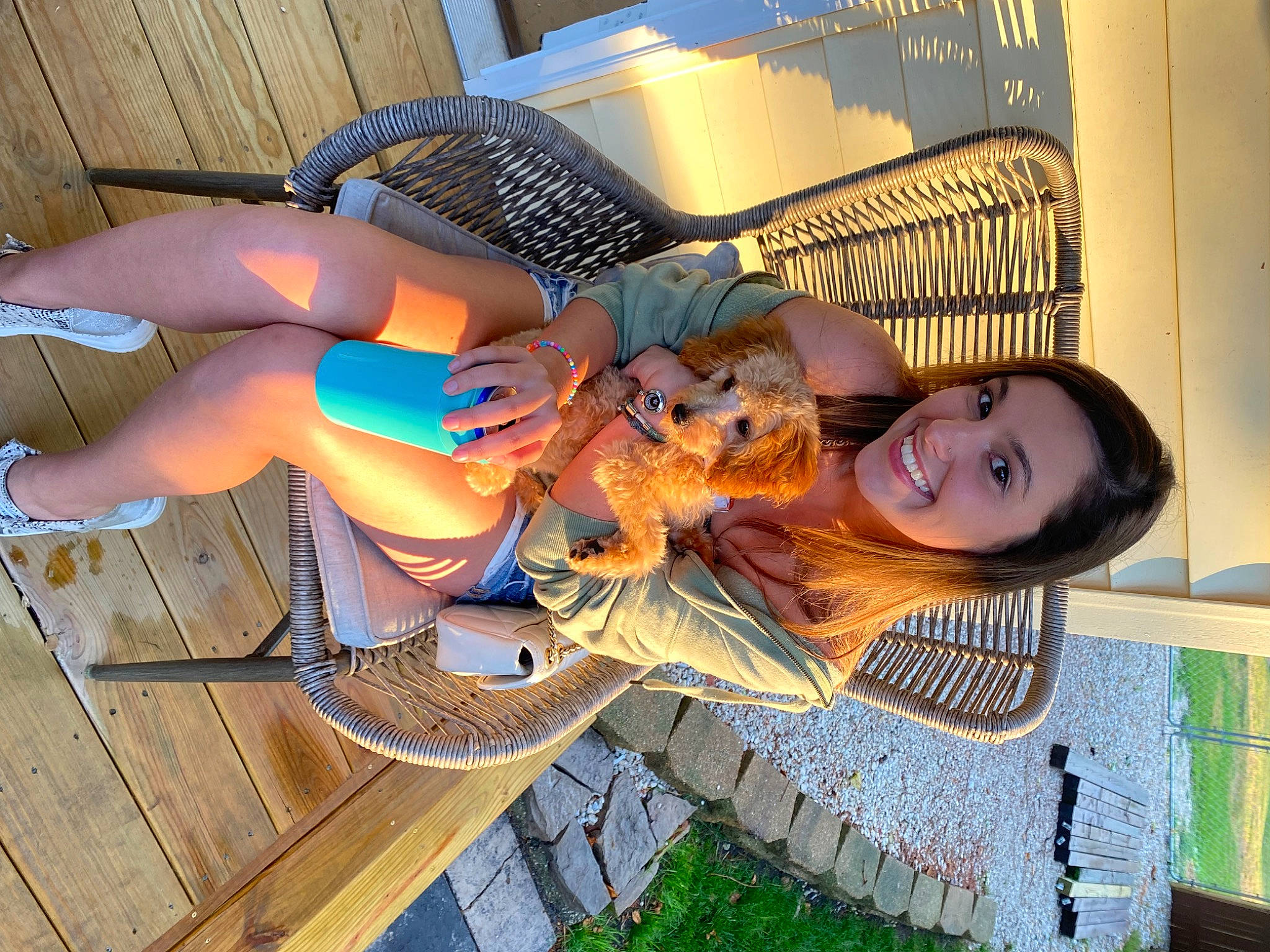 Hazel is registered to the contest to win money with this photo: art, child, eyewear, fun, grass, happy, hat, human_leg, knee, leisure, sandal, smile, thigh, vacation, wood, wrist