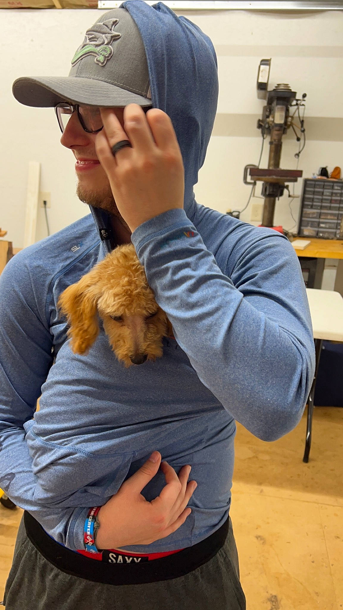 Hazel is registered to the contest to win money with this photo: baseball_cap, cap, carnivore, companion_dog, dog, dog_breed, elbow, eyewear, fawn, fur, gesture, hand, hat, safety_glove, smile, sporting_group, sunglasses, thumb, toy, wildlife_biologist