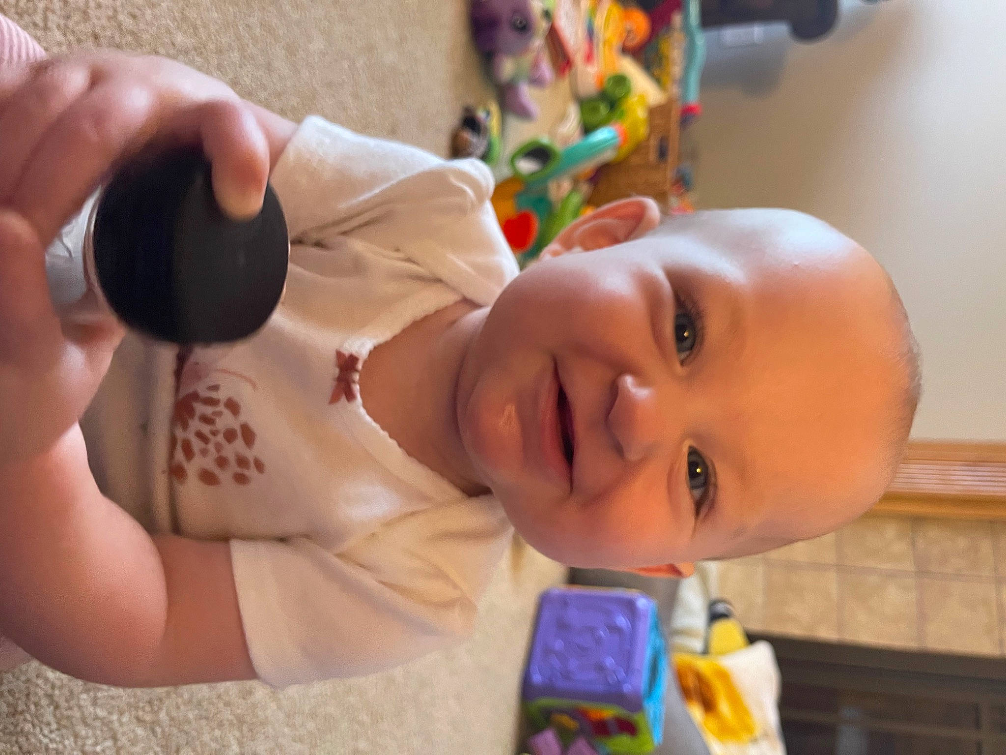 Georgia joined the competition — help win amazing prizes! baby, baby_products, baby_toddler_clothing, child, dress, event, eyelash, finger, fun, gesture, happy, jewellery, joy, leisure, nose, person, room, skin, smile, thumb