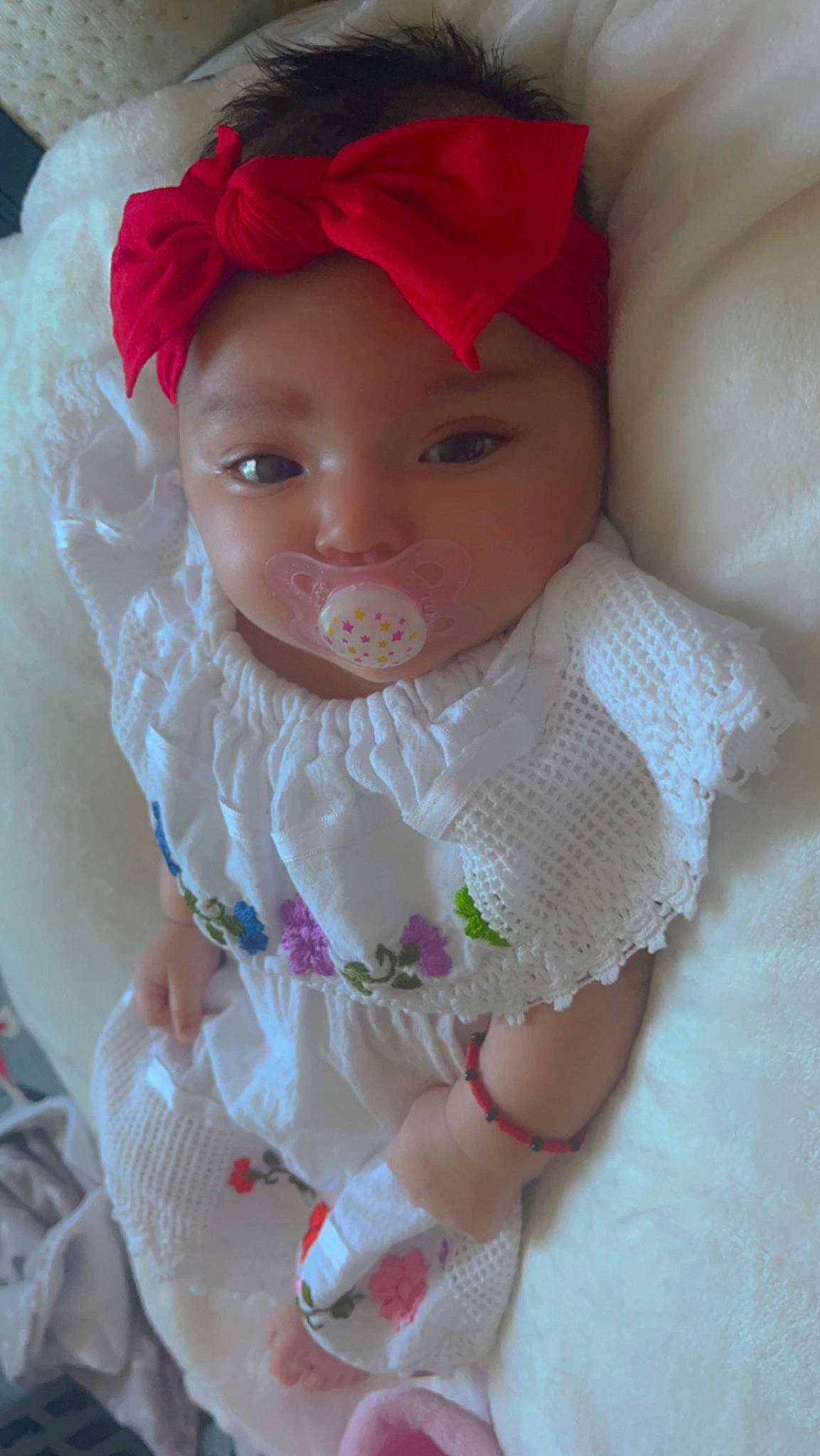Kamilah joined the competition — help win amazing prizes! arm, baby, baby_toddler_clothing, cap, cheek, dress, eyebrow, eyelash, hand, headgear, headpiece, headwear, human_body, iris, lip, mouth, person, pink, product, skin