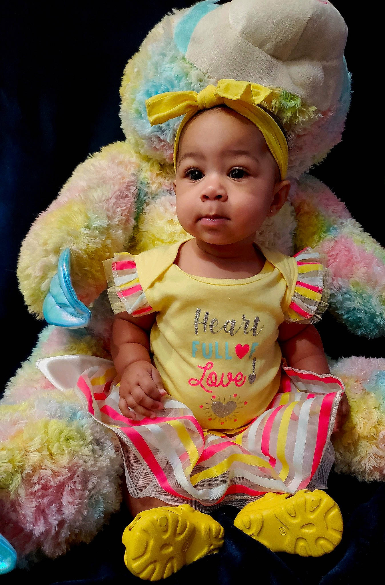 Inaya is registered to the contest to win money with this photo: baby, baby_toddler_clothing, cap, cheek, child, costume_hat, event, facial_expression, fashion_accessory, fun, happy, hat, headgear, organ, party_supply, person, pink, product, skin, toddler