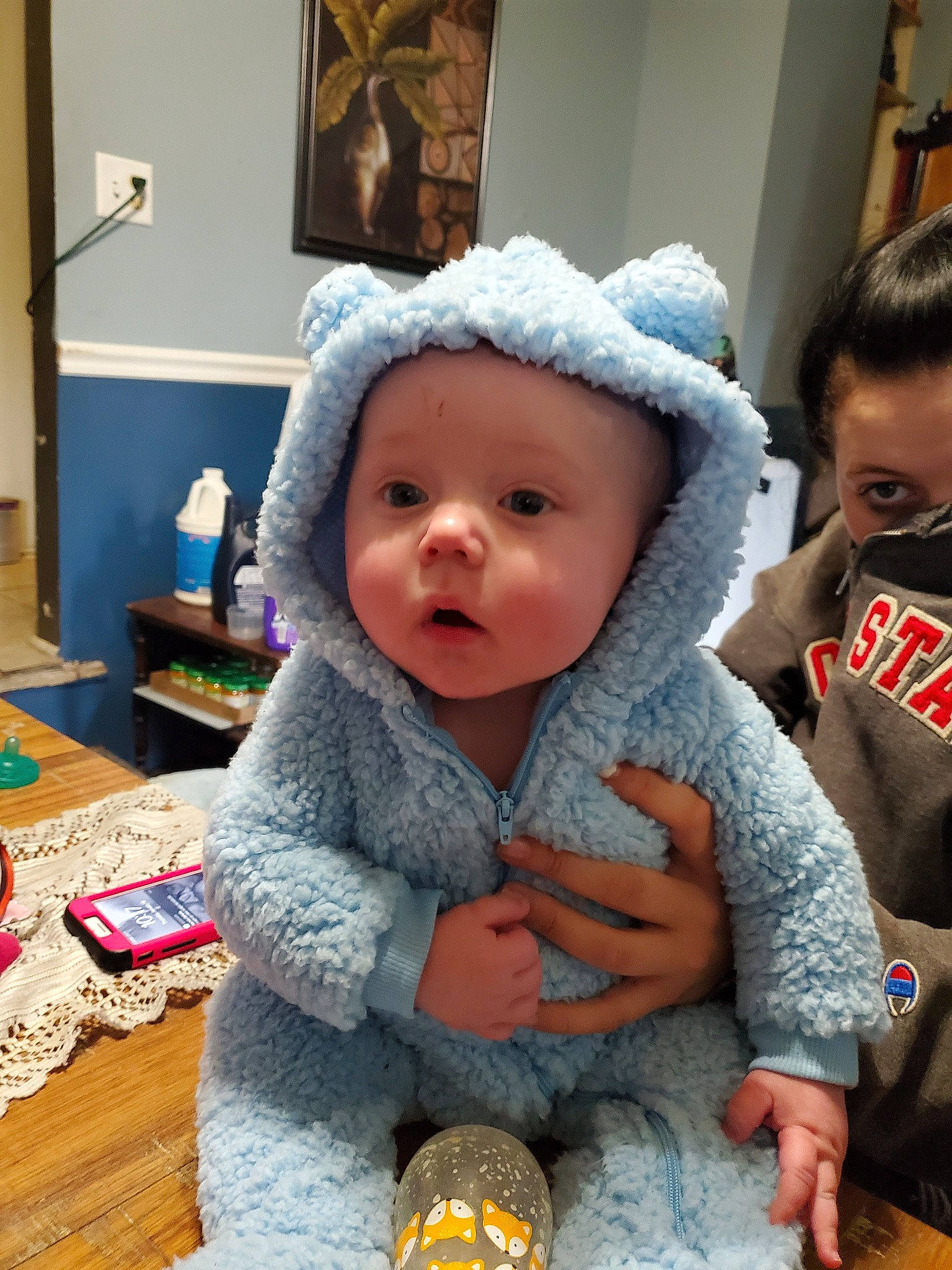Braven is registered to the contest to win money with this photo: baby, cheek, child, head, headgear, person, room, surprise, toddler, wool