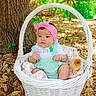 Alaiyah joined the competition — help win amazing prizes! baby, infant, basket, headband, pink, green, outdoor, tree, leaves, chick, animal, cute, nature, fluffy, blanket, wood, child, sitting, wicker, forest
