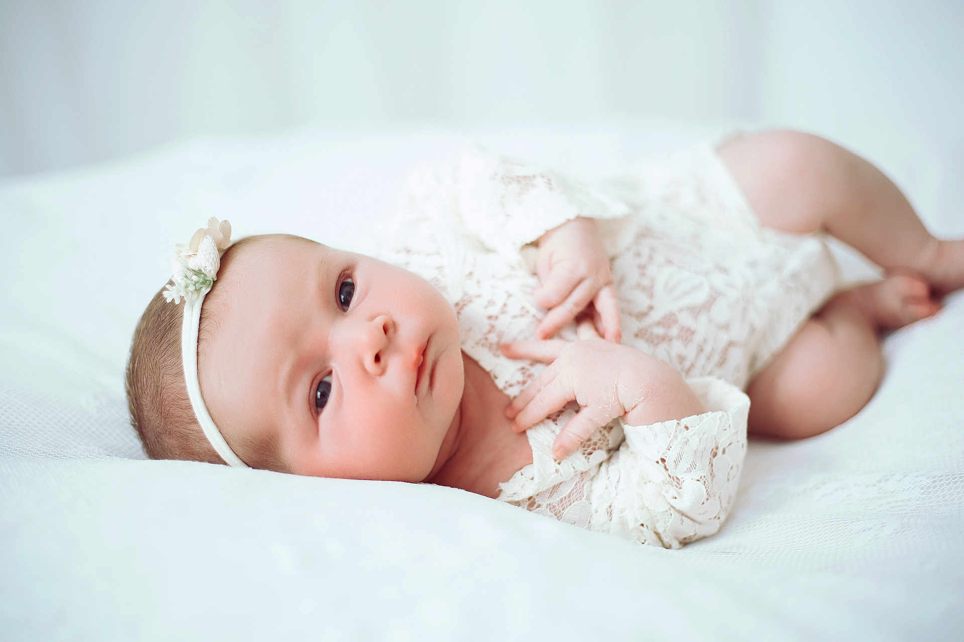 Bobbi-J joined the competition — help win amazing prizes! baby, infant, newborn, lace, headband, flower, white, soft, bed, cute, portrait, child, skin, face, hand, lying_down, peaceful, young, closeup, indoors