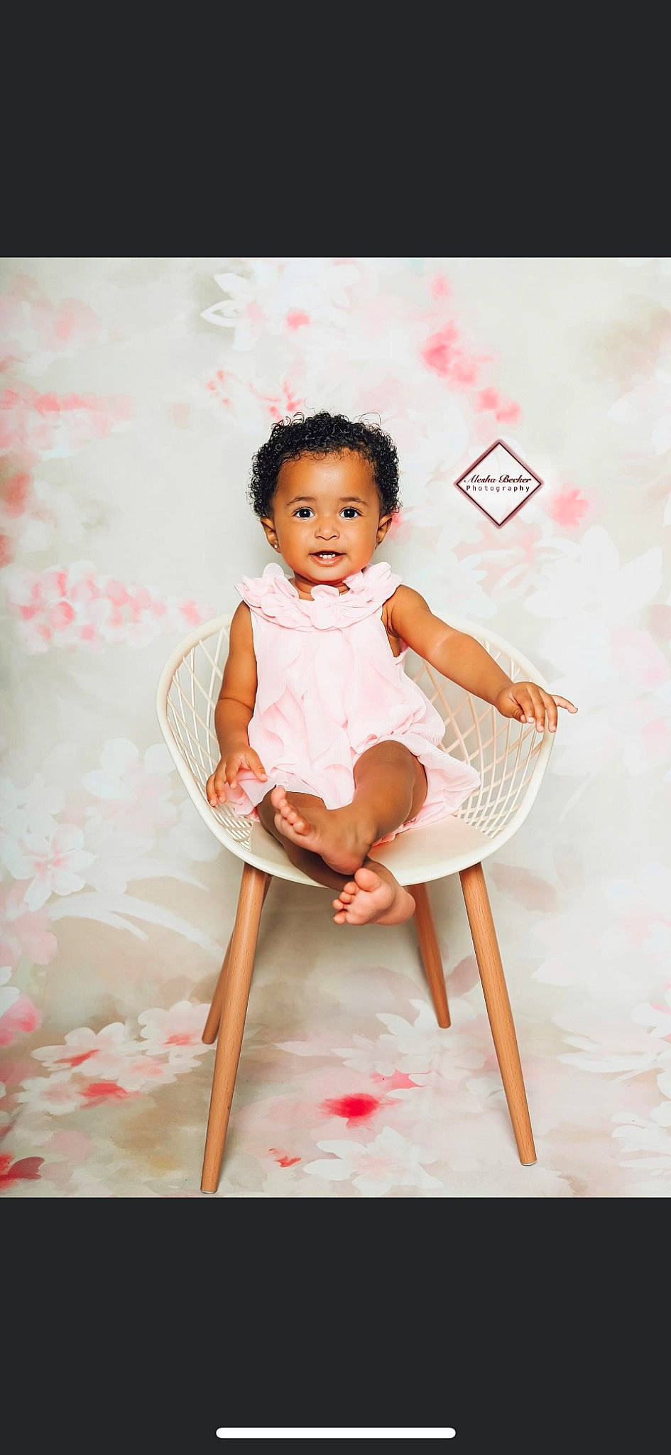 Amara joined the competition — help win amazing prizes! baby, baby_toddler_clothing, chair, cheek, child, dress, flash_photography, happy, human_leg, leg, magenta, peach, person, pink, room, shorts, sitting, skin, sleeve, t_shirt