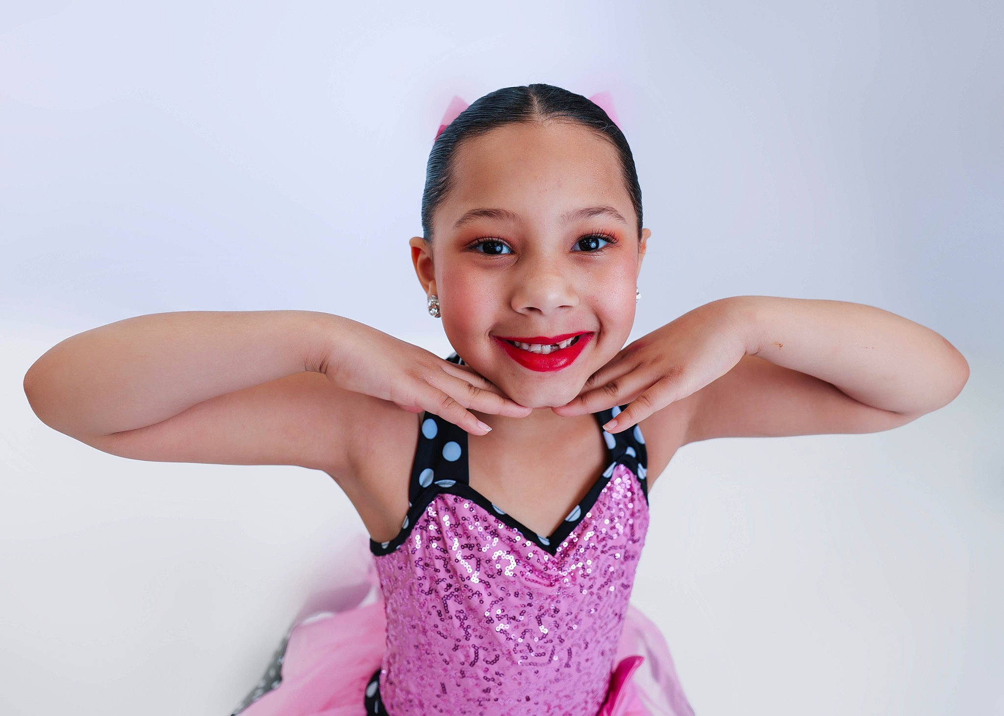 Leia is registered to the contest to win money with this photo: day_dress, event, eye, eyebrow, eyelash, face, fashion_design, flash_photography, formal_wear, gesture, hair, happy, head, joy, makeover, neck, one_piece_garment, pattern, person, sleeve