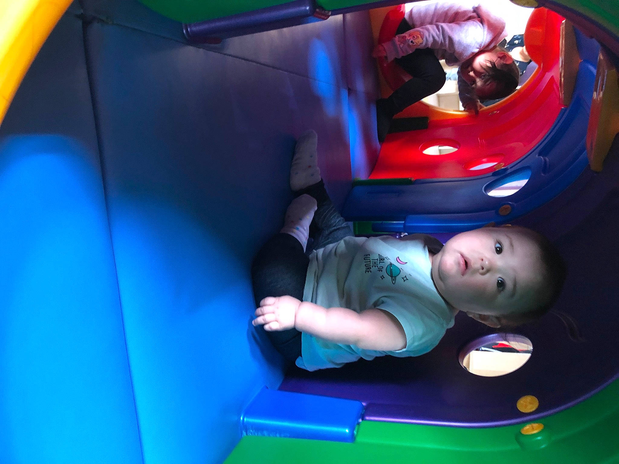 Olivia is registered to the contest to win money with this photo: auto_part, automotive_design, automotive_exterior, baby, baby_products, blue, bumper, car_seat, child, electric_blue, fun, inflatable, leisure, motor_vehicle, person, play, playground, recreation, toddler, trunk