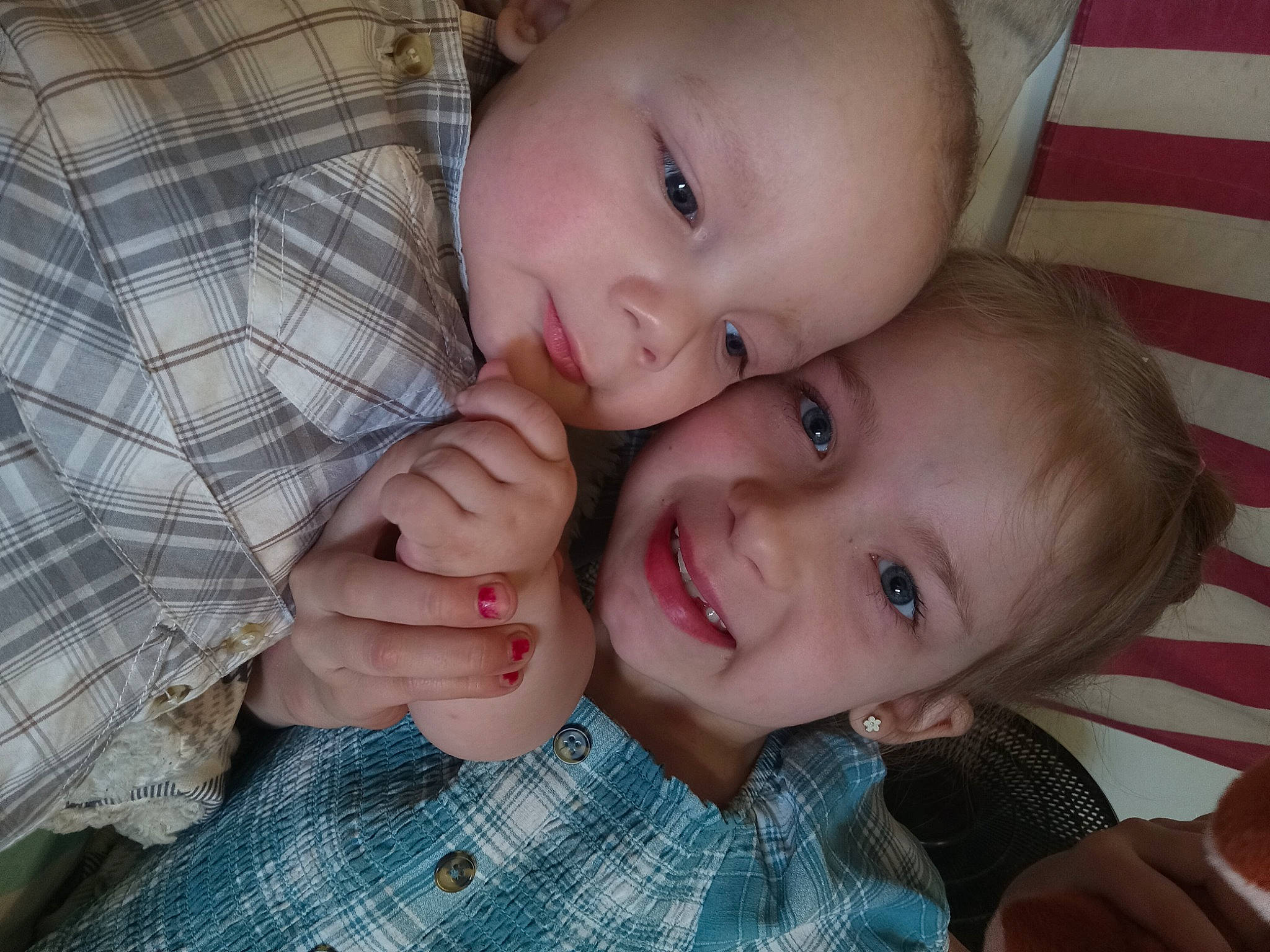 Annabella is registered to the contest to win money with this photo: baby_toddler_clothing, cheek, chin, comfort, eye, face, finger, gesture, happy, head, iris, joy, lip, mouth, nose, organ, person, skin, sleeve, smile