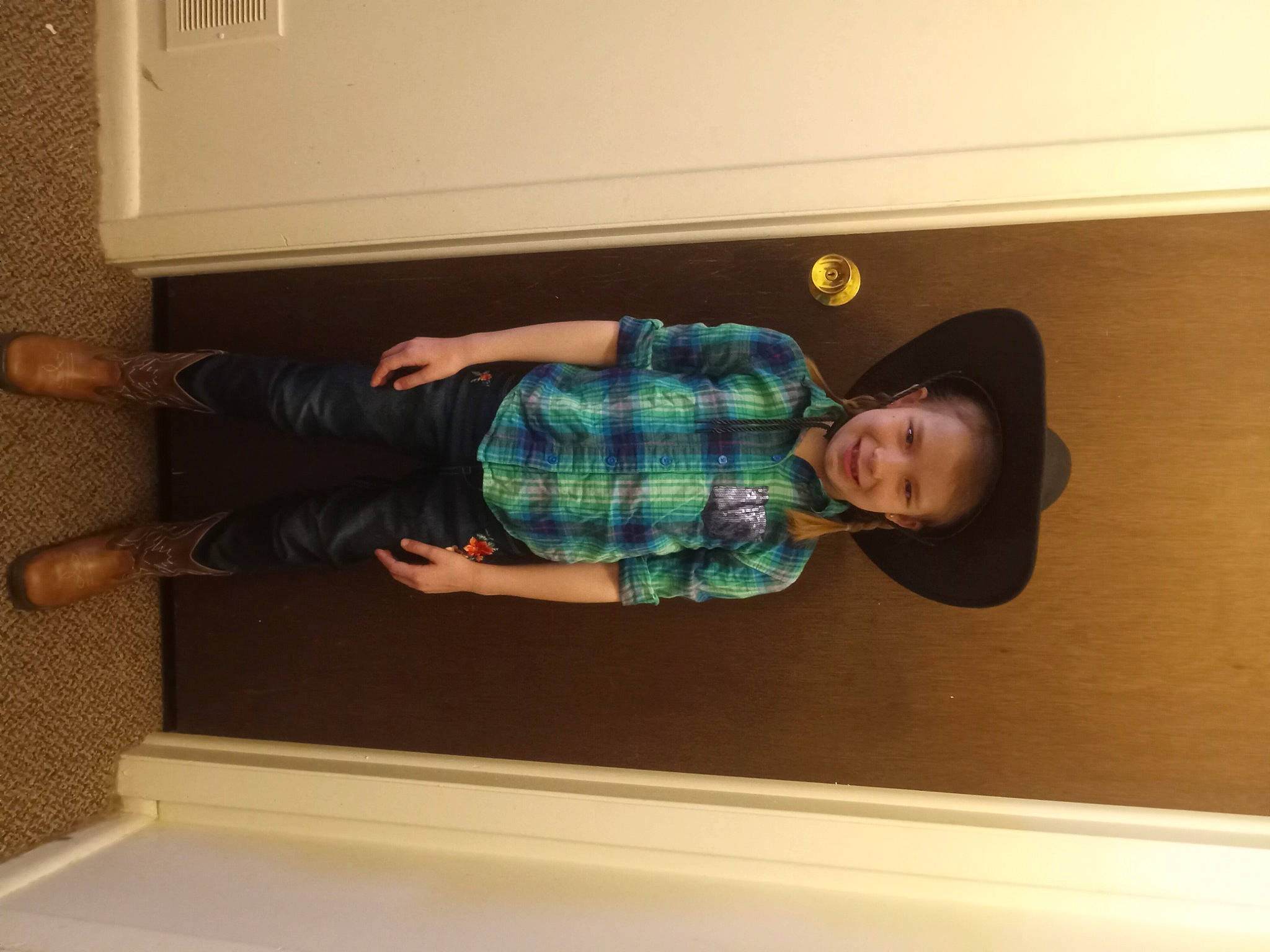 Annabella is registered to the contest to win money with this photo: comfort, elbow, floor, flooring, foot, fun, hardwood, human_leg, joy, knee, leg, person, room, sitting, sleeve, smile, sock, t_shirt, thigh, waist