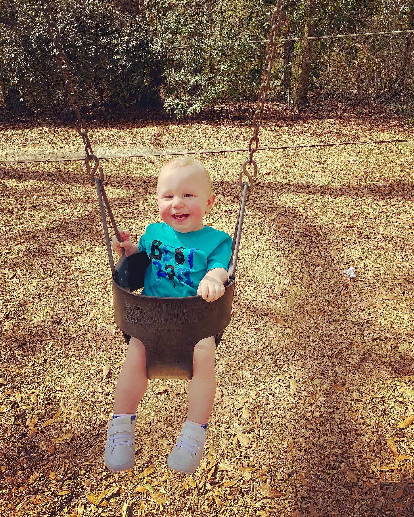 Corbin joined the competition — help win amazing prizes! baby, baby_toddler_clothing, child, facial_expression, fun, grass, happy, joy, leisure, nature, people_in_nature, person, plant, playground, recreation, sleeve, smile, swing, tints_and_shades, toddler