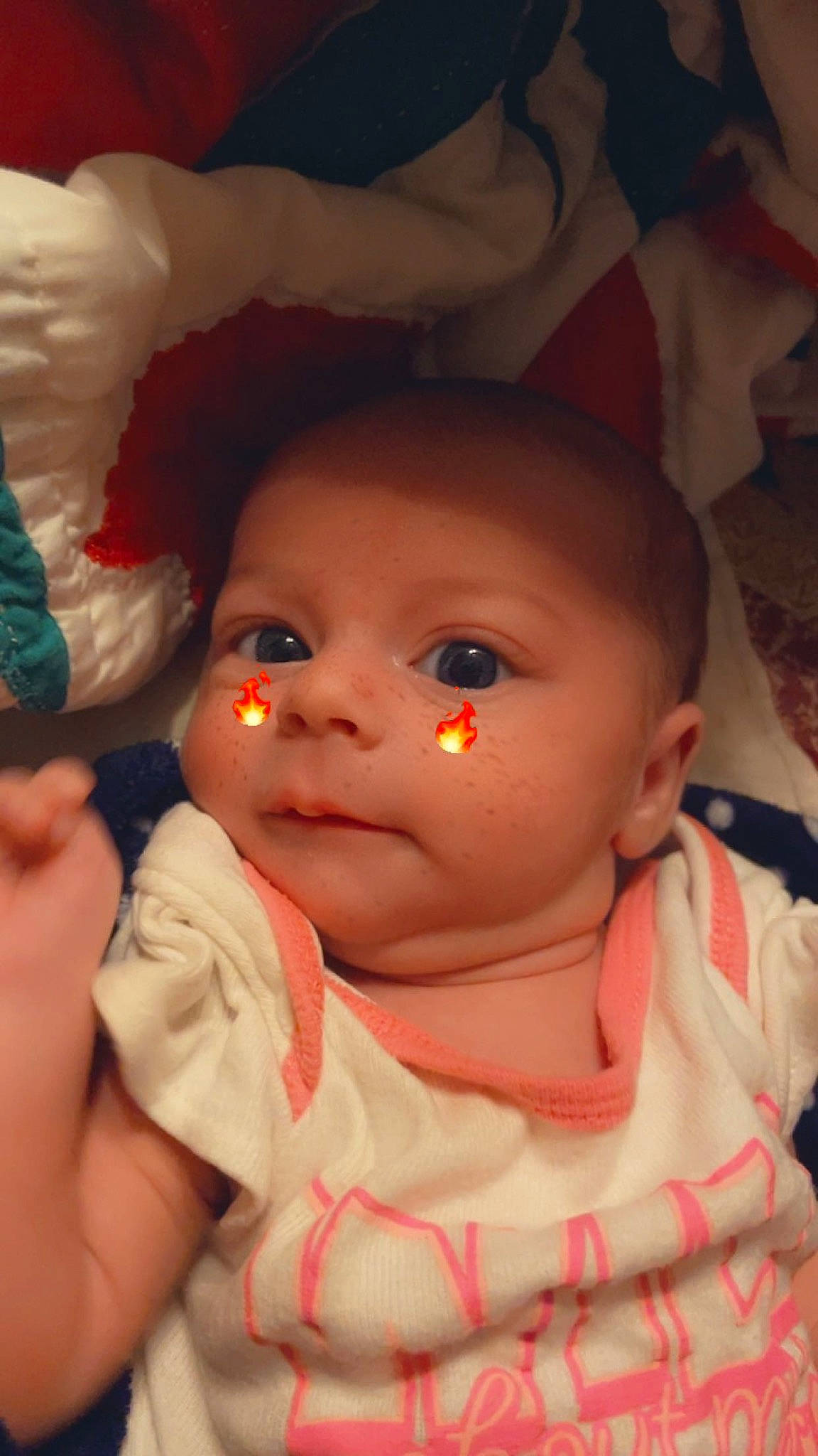 April is registered to the contest to win money with this photo: cheek, chin, doll, ear, eye, eyebrow, eyelash, forehead, gesture, hair, hairstyle, head, human_body, iris, lip, mouth, nose, person, skin, textile