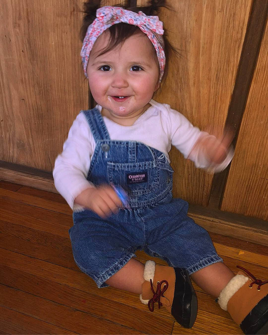 Emberly Willow Rose is registered to the contest to win money with this photo: baby, baby_toddler_clothing, child, child_model, hair_accessory, iris, jeans, joy, person, sitting, skin, smile, standing, toddler, wood