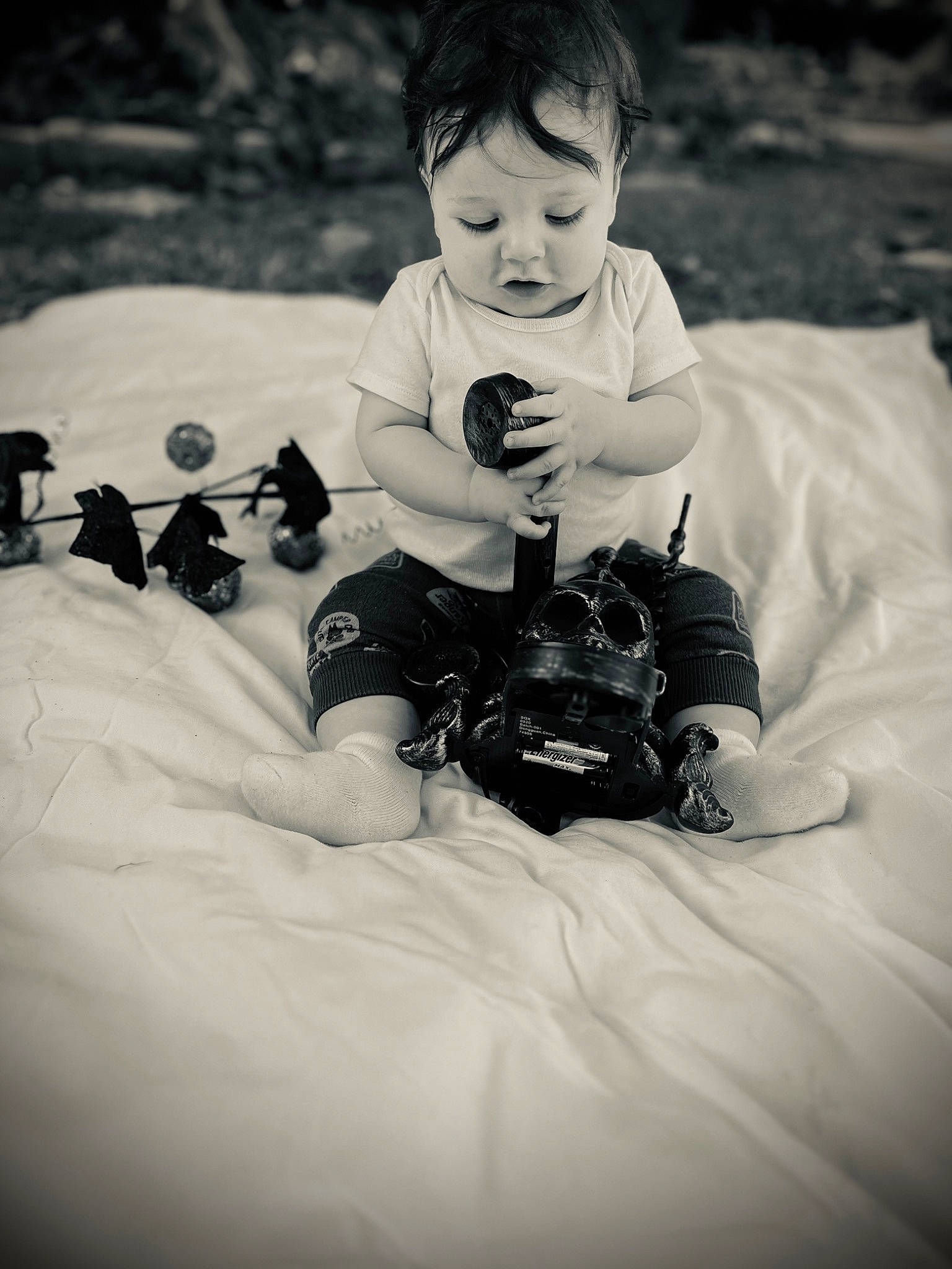 Pablo joined the competition — help win amazing prizes! arm, baby, black, black_and_white, camera, child, comfort, eye, face, flash_photography, fun, grass, hand, happy, head, monochrome, monochrome_photography, person, sitting, style
